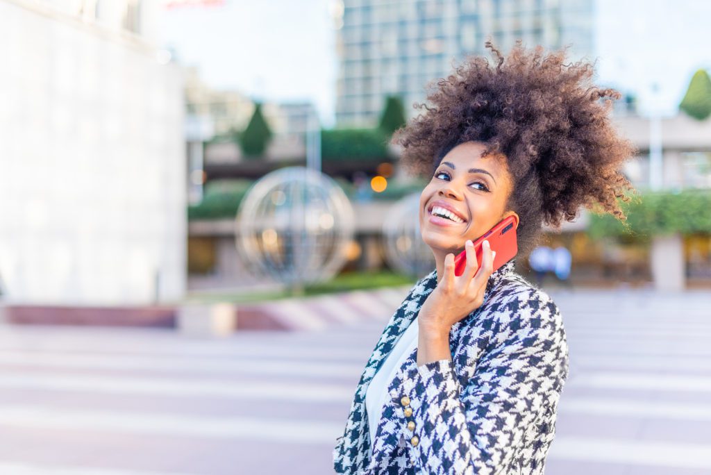 Smiling business woman talking on the phone